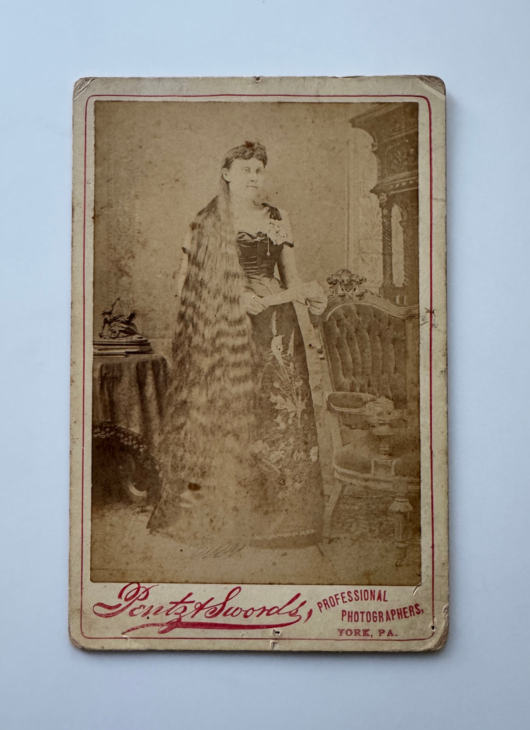 Woman with long hair. Cabinet card.